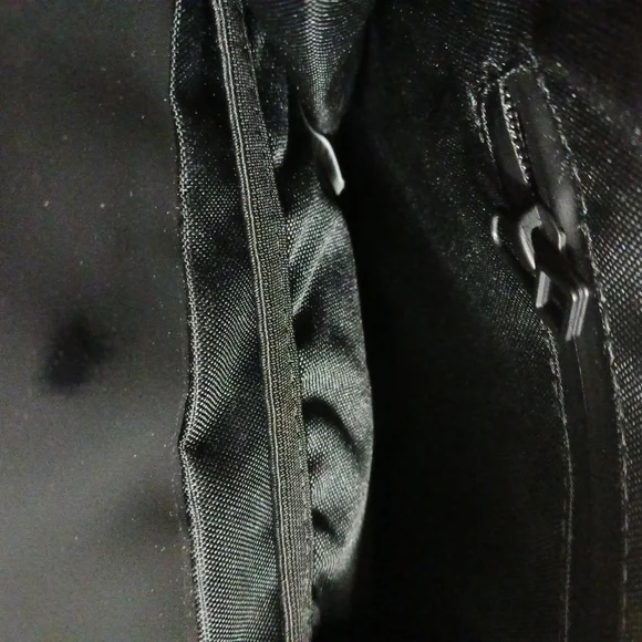 Rains Black Minimalist Backpack with Flap Closure